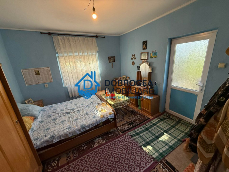 Caslita - teren 513 mp, pomi fructiferi, casa 2 camere
