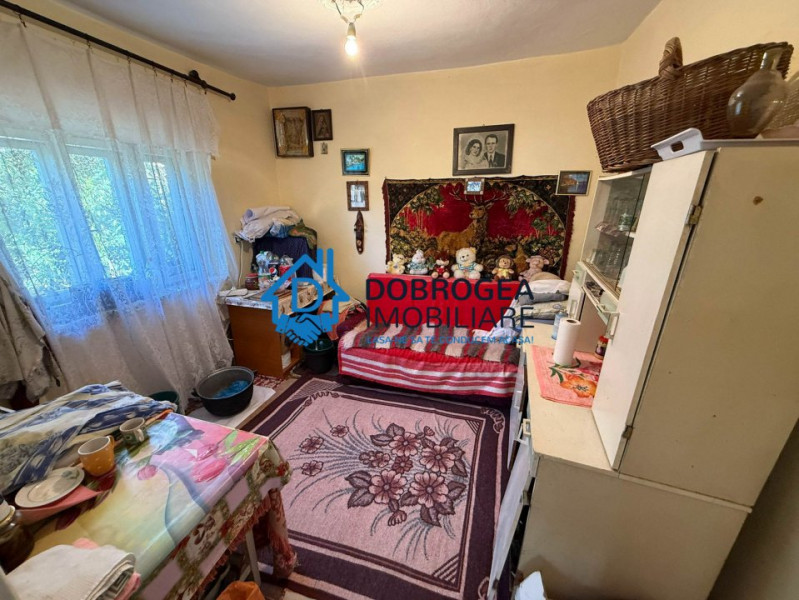 Caslita - teren 513 mp, pomi fructiferi, casa 2 camere