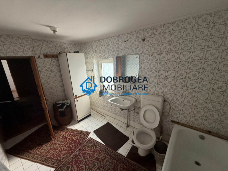 Casa batraneasca 229 mp + teren 675 mp, deschidere stradala 15,8 ml