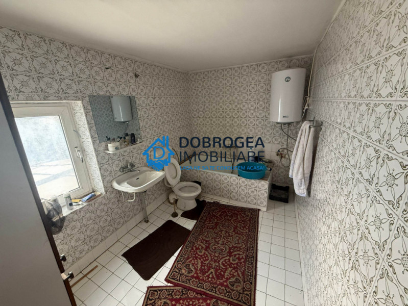 Casa batraneasca 229 mp + teren 675 mp, deschidere stradala 15,8 ml