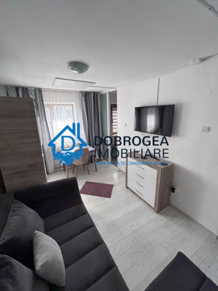 23 AUGUST-GARSONIERA DE INCHIRIAT