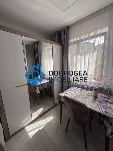 23 AUGUST-GARSONIERA DE INCHIRIAT