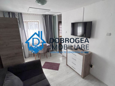 23 AUGUST-GARSONIERA DE INCHIRIAT